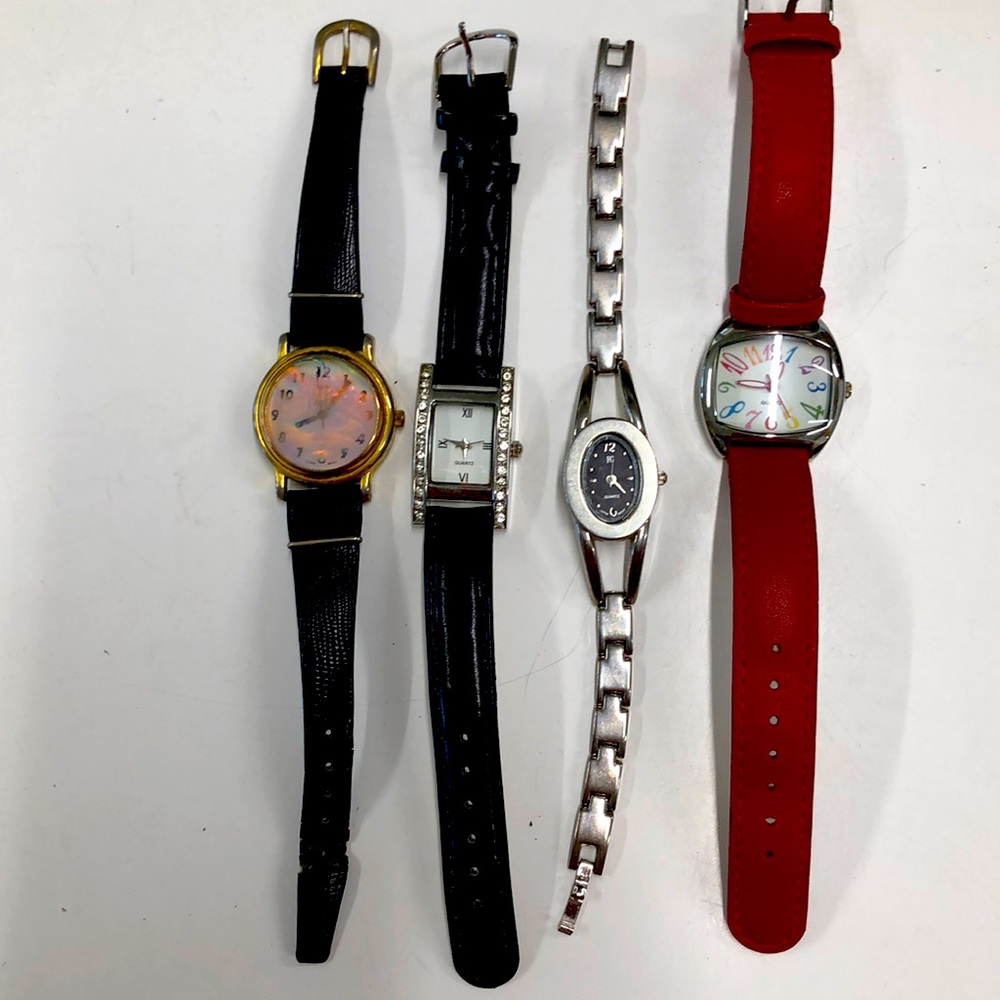Lot of 4  Vintage Quartz Women’s watches. Round Gold face is a Holo Watch